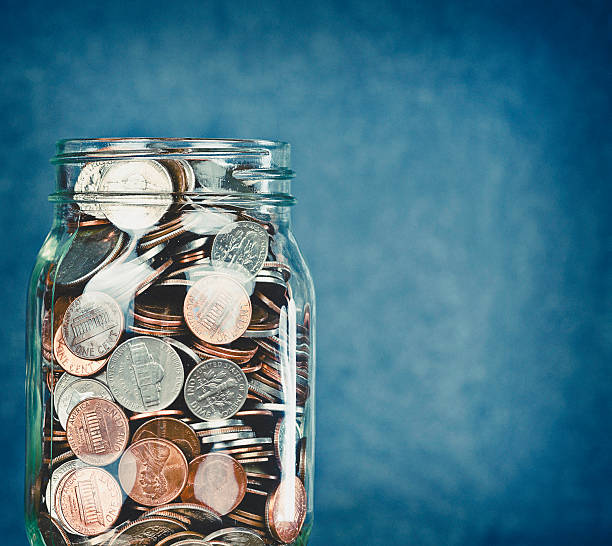 istock Money jar filled with American currency 512489112