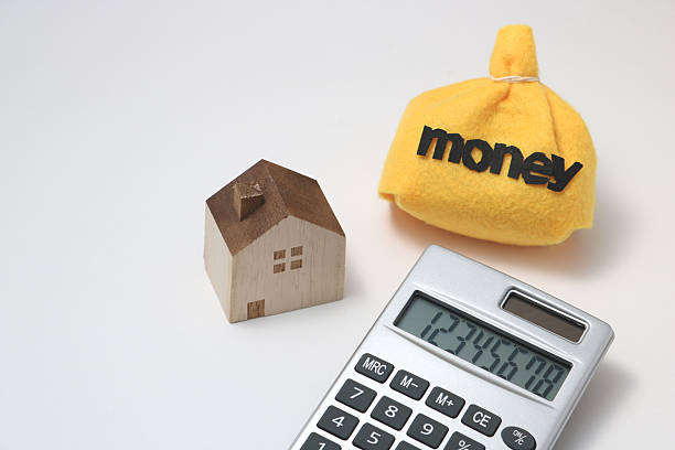 istock House, money, and calculator 512489120
