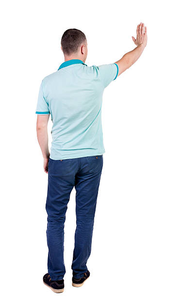istock Back side view of man  in shirt handshake. 512491385
