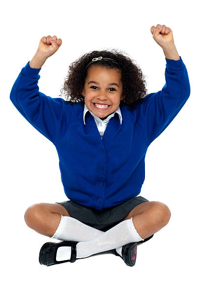 istock Primary school girl grinding her teeth in excitement 512491827