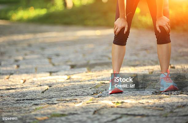Tired Woman Runner Have A Rest After Running Hard Stock Photo - Download Image Now - Adult, Adults Only, Asian and Indian Ethnicities
