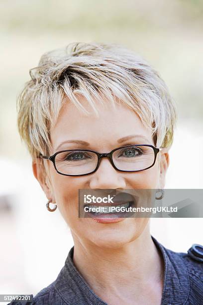 Smiling Woman Stock Photo - Download Image Now - Short Hair, Women, Mature Women