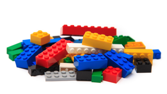 Ankara, Turkey - October 20, 2013: Colorful Lego building bricks and blocks on white background. The Lego toys were originally designed in the 1940s in Denmark and have achieved an international appeal.