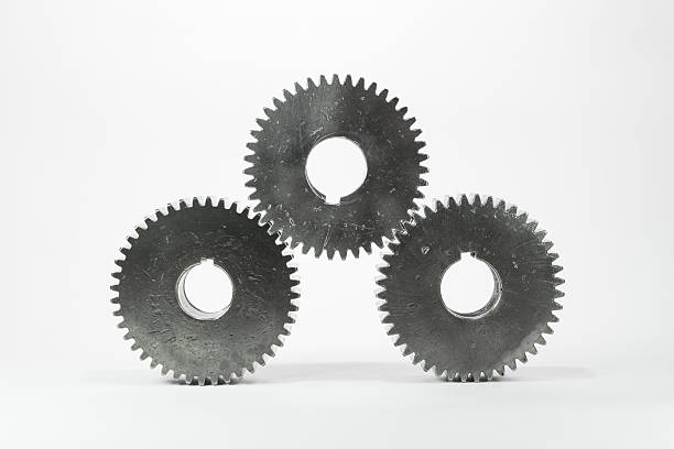 istock three of gears set on isolated background 512493532