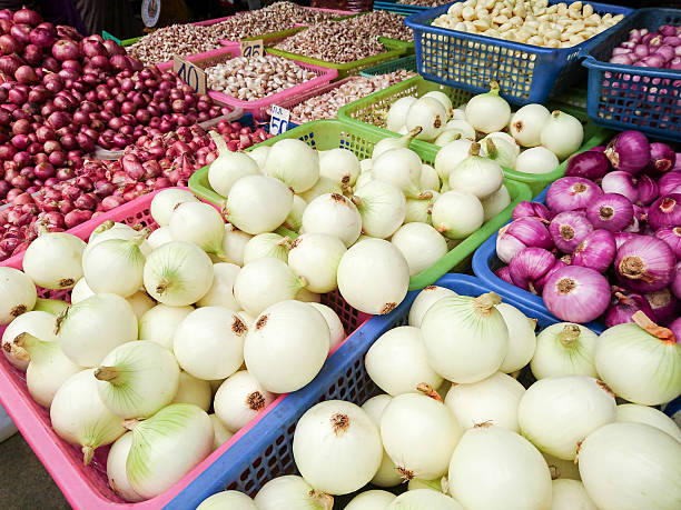 istock Fresh onions and garlic in a trational Thai market. 512493838