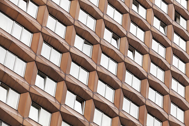 istock Modern architecture abstract fragment, metal facade with windows 512494167
