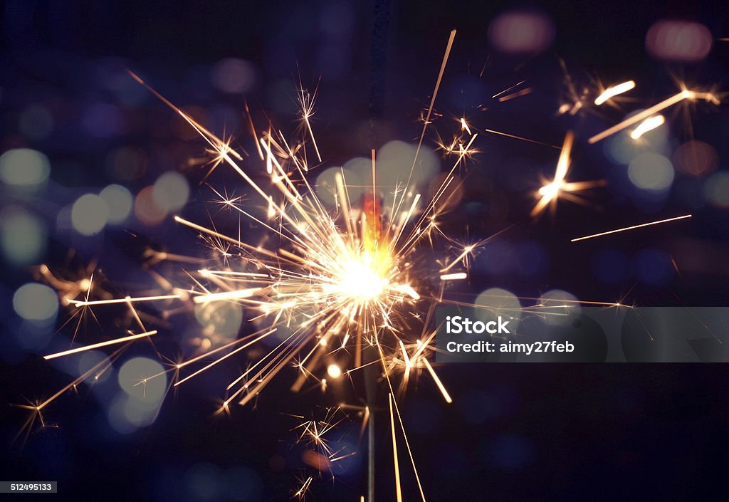 holiday background with a sparkler Sparkler - Firework Stock Photo