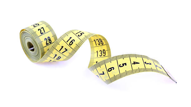 istock Measuring tape isolated on white background 512495318