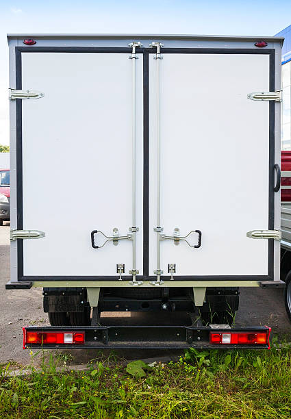 istock Rear view of new white cargo truck 512495485