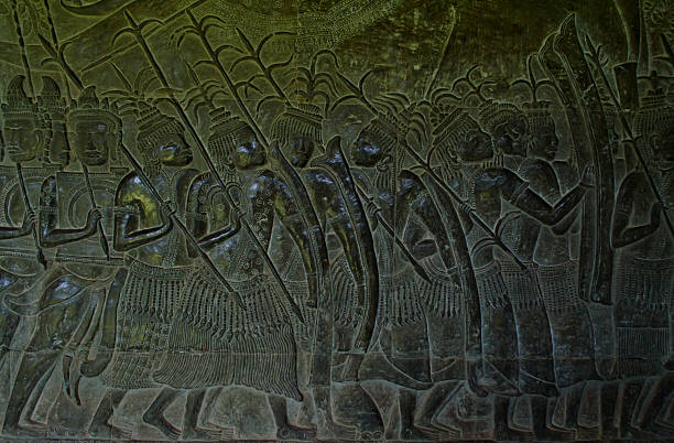 istock sculpture of army at Angkor Wat 512495695