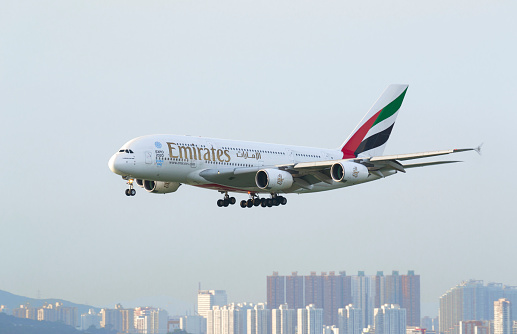 Hong Kong, China – May 28, 2014: Emirates Airbus 380 arrive in Hong Kong International Airport. Emirates is an airline based in Dubai.