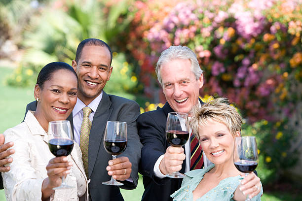 istock Ffriends drinking wine outdoors 512497651