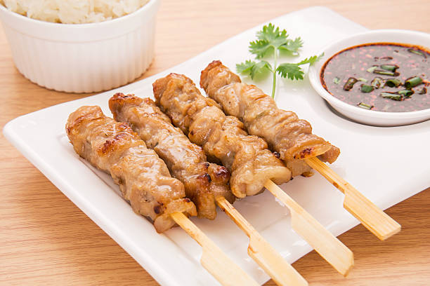 istock Grilled pork with spicy sauce and sticky rice, Thai foo 512497761