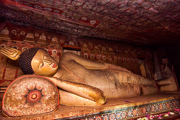 istock Ancient Buddha Statue in Dambulla Cave Temple, Sri Lanka 512505492