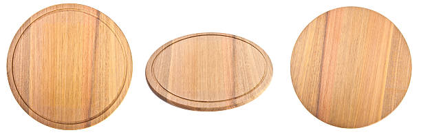 istock Set round a wooden cutting board on a white background 512506150