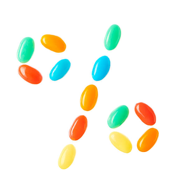 istock % symbol made of multicolored candies isolated on white 512509062