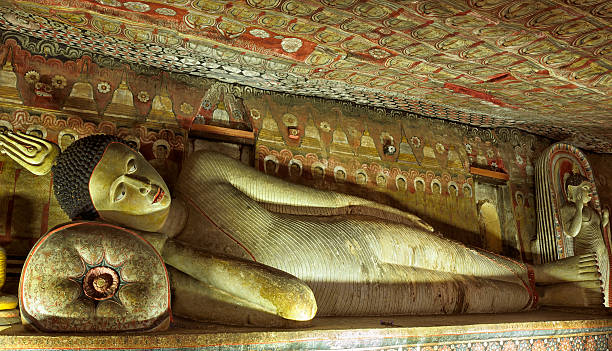 istock Ancient Buddha Statue in Dambulla Cave Temple, Sri Lanka 512510566