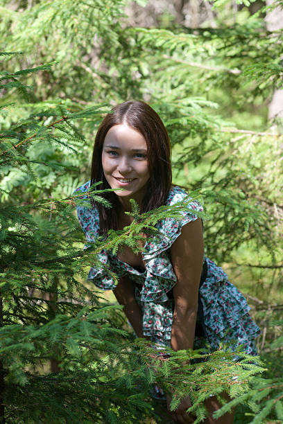 istock girl in fir-tree wood 512510864