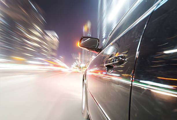istock car on the road with motion blur background 512517473