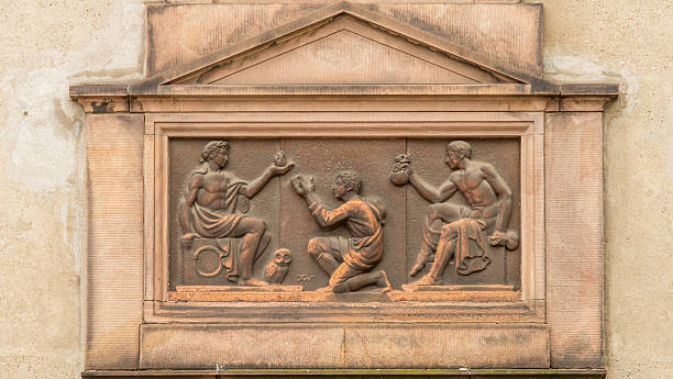 istock Art Deco relief  man receiving fire, wisdom and wealth 512518009