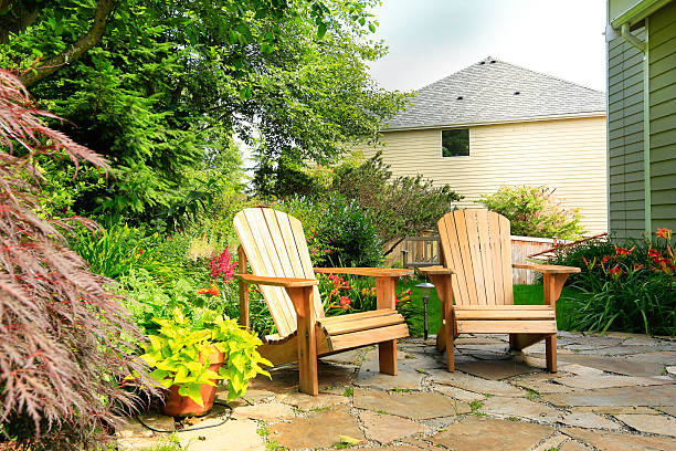 istock Outdoor rest area. Backyard with wooden chairs 512518707
