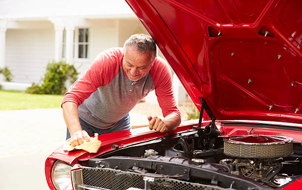istock Retired Senior Man Cleaning Restored Classic Car 512518725