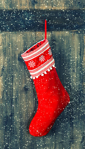 istock red sock for Santa gifts. christmas stocking 512518955