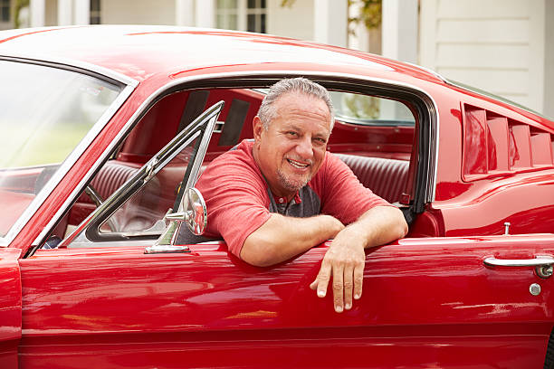 istock Retired Senior Man Sitting In Restored Classic Car 512519021