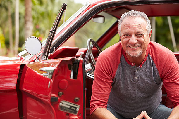 istock Retired Senior Man Sitting In Restored Classic Car 512519047