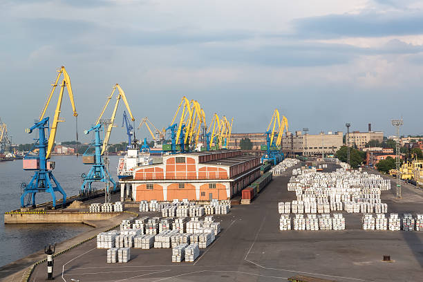 istock St. Petersburg harbor cranes and cargo 512519101