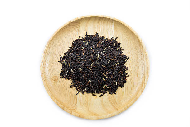 istock Rice berry in wooden bowls on white background. concept 512521944