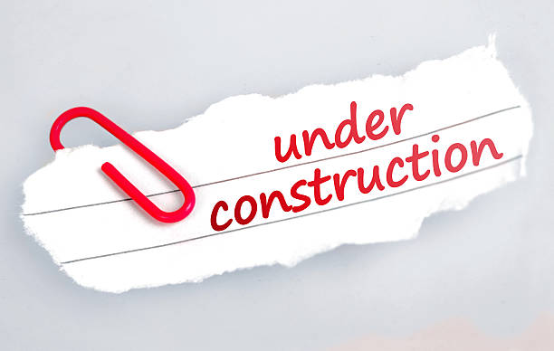 Under construction word stock photo