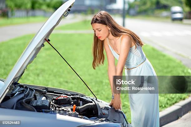 Woman Waits For Assistance Near Her Car Broken Down Stock Photo - Download Image Now