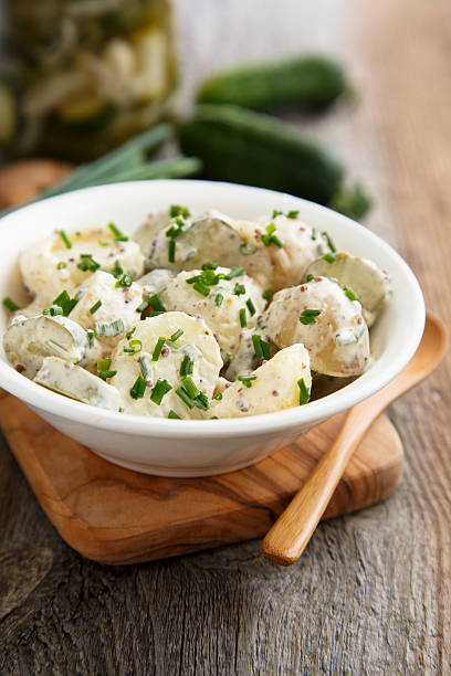 istock Potato salad with chives 512526628