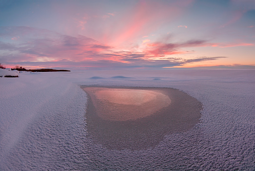 Winter landscape with the silhouette of the heart. Composition of nature.