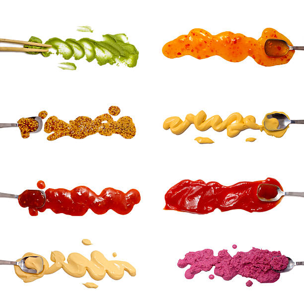 istock Set of 8 savory sauces and dips isolated on white 512540690