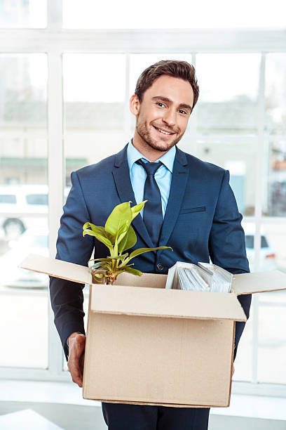 istock Businessman moving to new home 512541004
