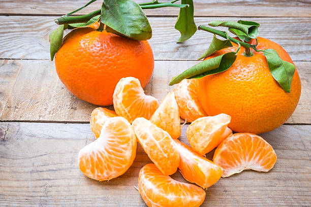 istock several mature citrus on an old wooden table 512543010