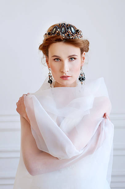 istock Beautiful royal bride wearing gorgeous beaded headpiece 512543062