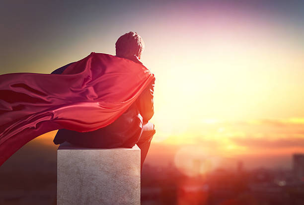 istock superhero businessman looking at city 512543414