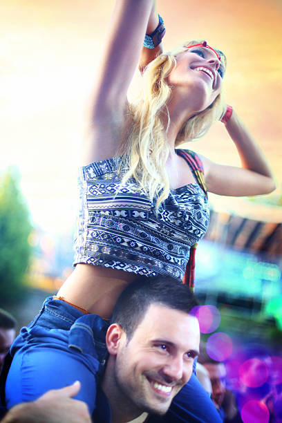 istock Young couple enjoying a concert. 512545061
