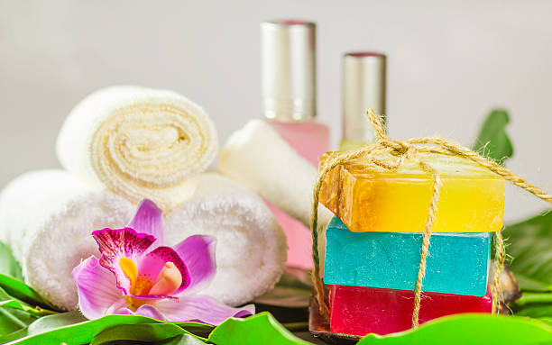 istock cosmetics bottles, soap and towels spa 512545515