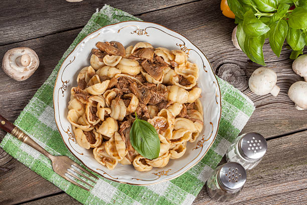 istock Pork stew with mushrooms, basil and red pepper. 512545691