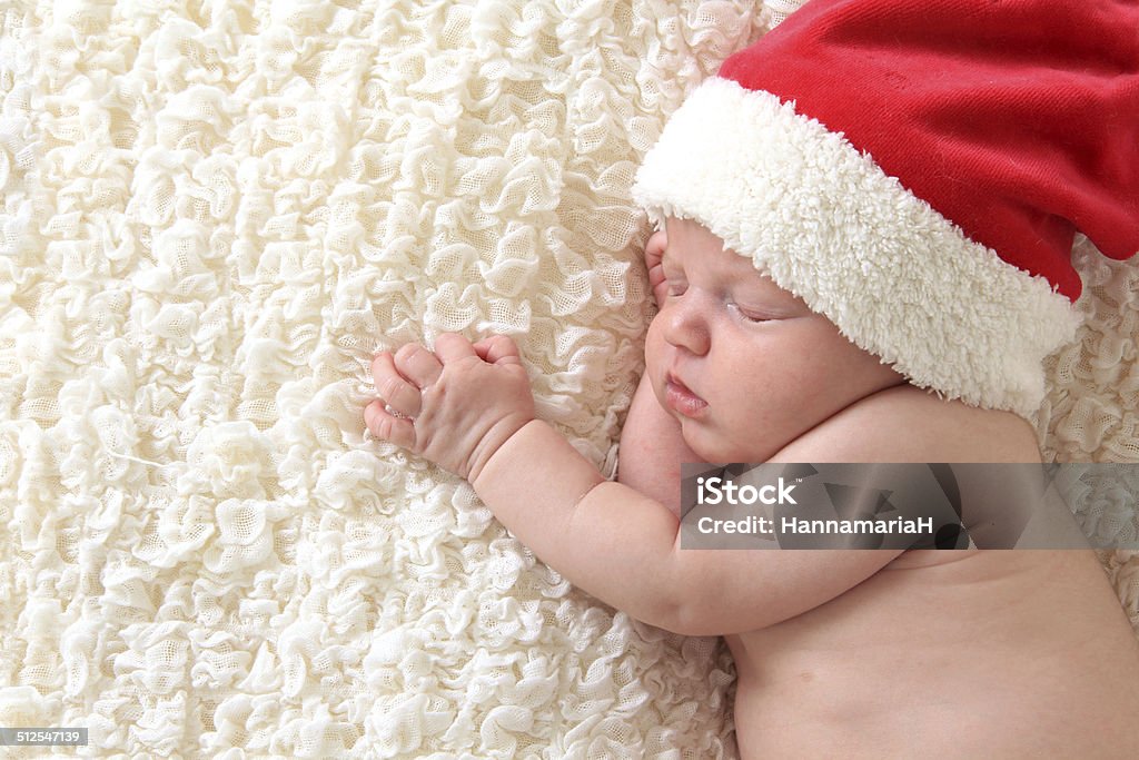 Christmas baby Christmas baby wearing a Santa hat. Babies Only Stock Photo