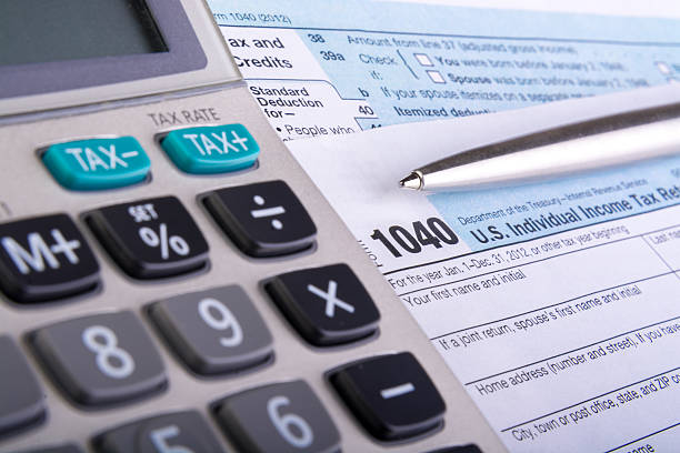 istock Tax Form 1040 with Calculator 512548915
