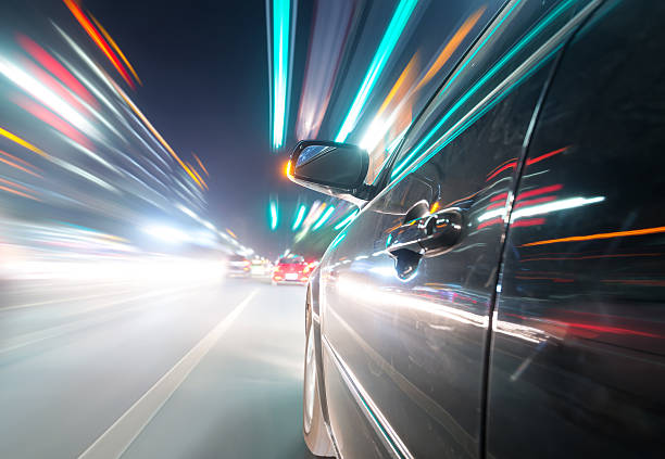 istock car on the road with motion blur background 512549073