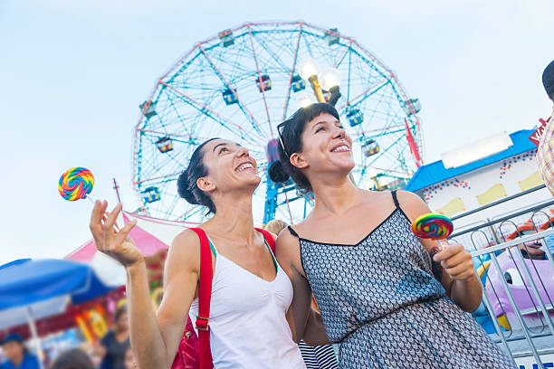 istock Happy Young Women at Luna Park 512549311
