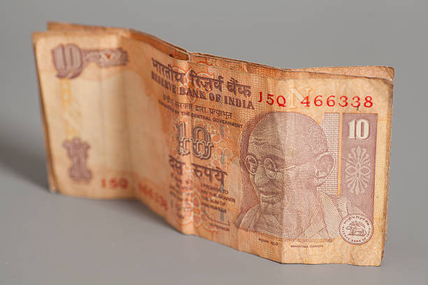 istock Ten Indian rupees isolated on gray background 512549314
