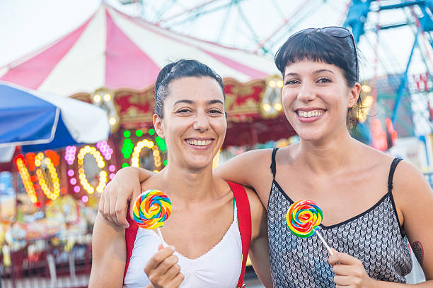 istock Happy Young Women at Luna Park 512549325