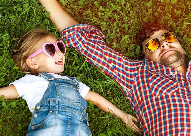 istock Father with daughter In Park smiling happy 512549675